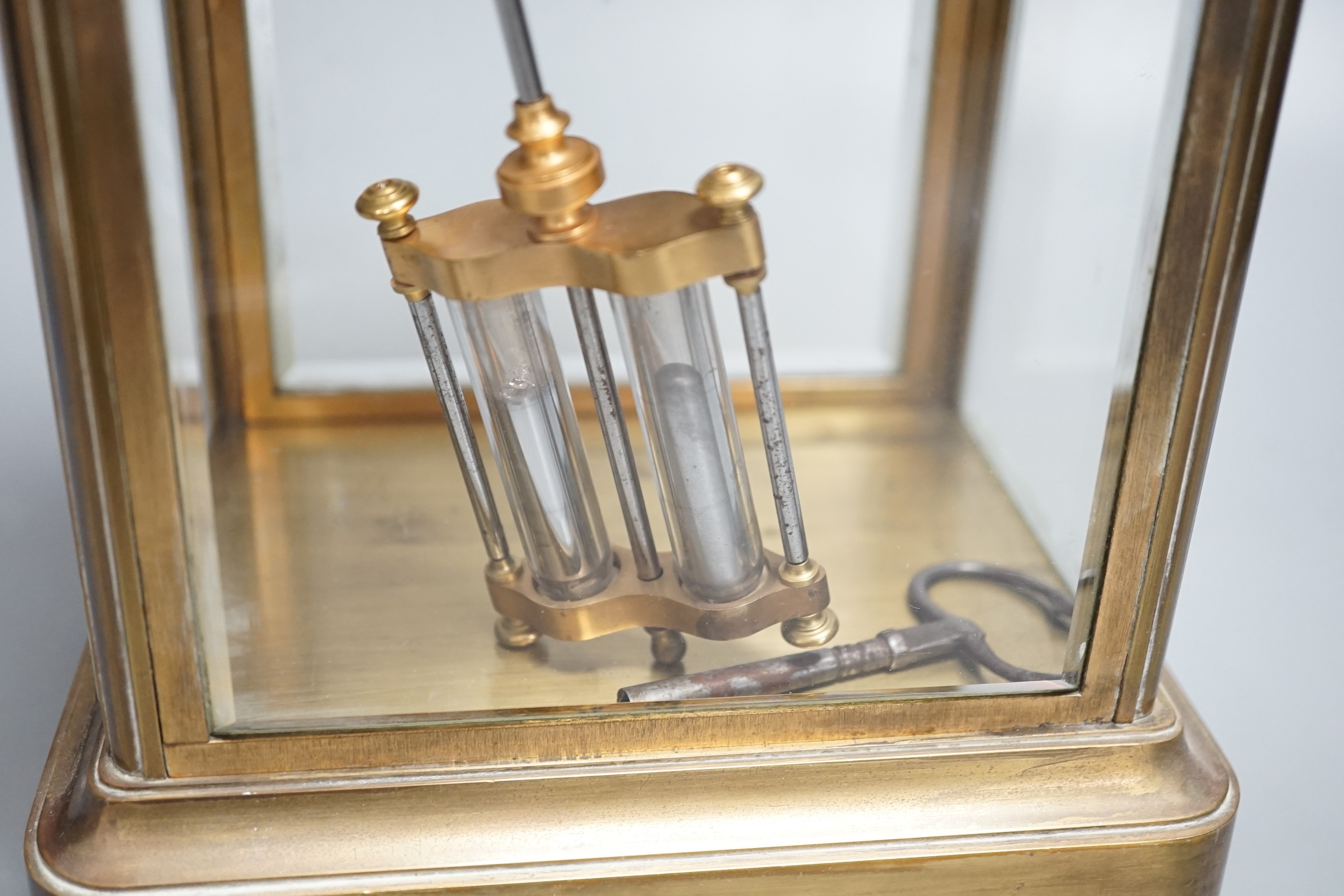 A late 19th century French four glass mantel clock with S.Marti movement, mercury pendulum & key. 30cm